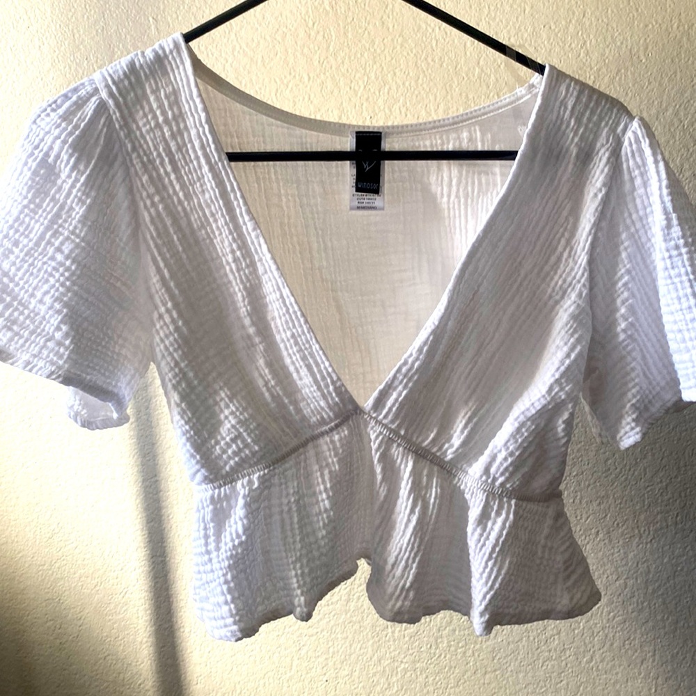 White blouse with ruffled bottom